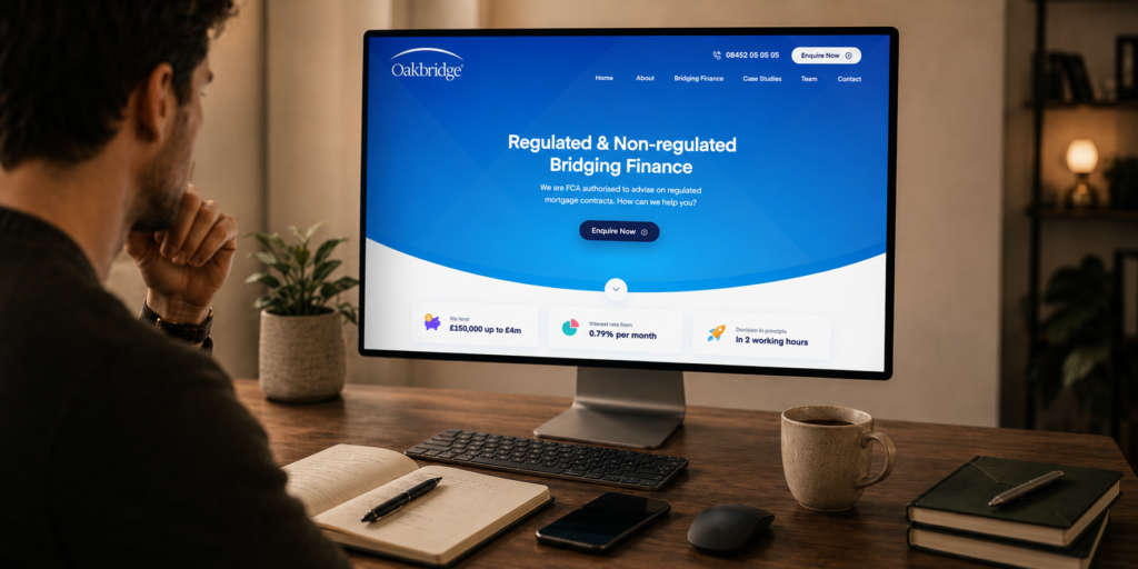 Person reviewing the Oakbridge finance website homepage on a desktop monitor in a professional office.