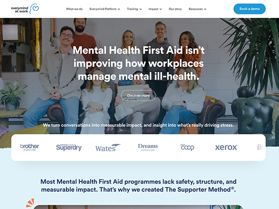 Corporate platform homepage with workplace wellbeing messaging, team photography and client logos